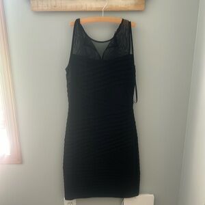 Short, sleeveless black Calvin Klein cocktail dress